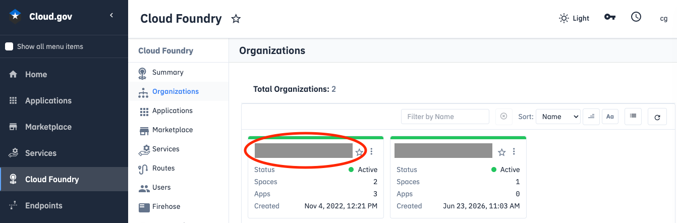 "Click on the box of the organization that you want to manage users for."